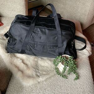 Like new black GAP duffel bag and travel toiletry travel bag